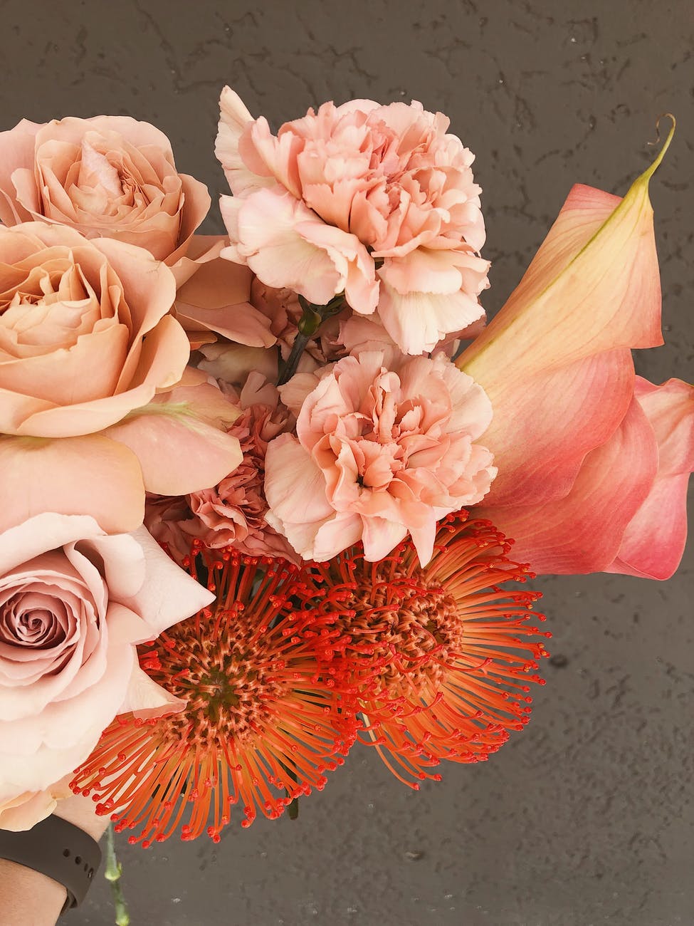 tender bouquet of pink and red flowers