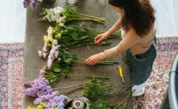 top view of a woman making flower arrangement