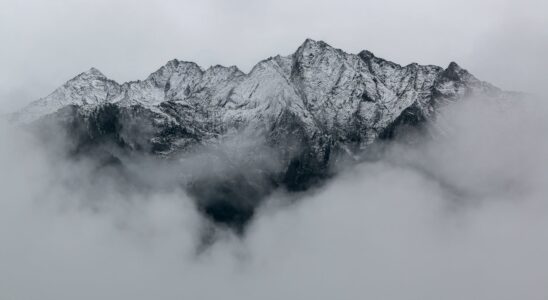 landscape photography of mountains covered in snow